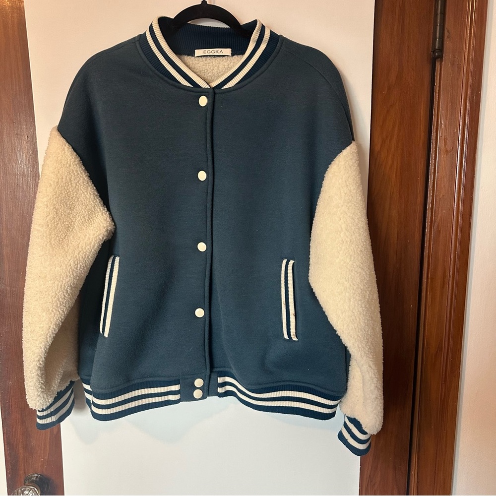 Blue varsity jacket with Sherpa sleeves